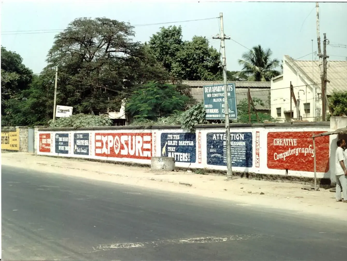 Hand-painted Exposure roadside wall branding - 'Creative Computergraphy'