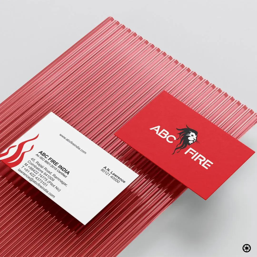 ABC Fire - director's visiting card: red face with lion-and-wordmark, white reverse with company address and contact details