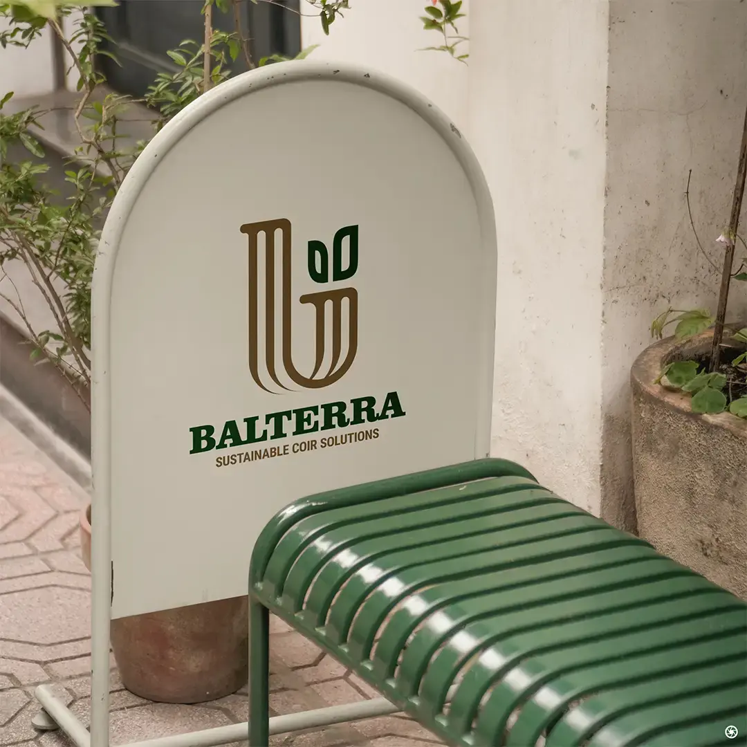 Balterra — outdoor sign board at facility entrance carrying the brand identity at scale, Kumarapalayam, Dindigul