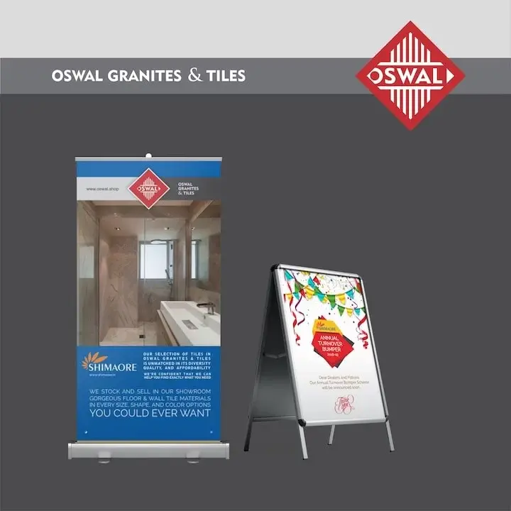 Oswal Granites & Tiles - Shimaore showroom rollup banner with bathroom tile photography and Annual Turnover Bumper A-board for dealers