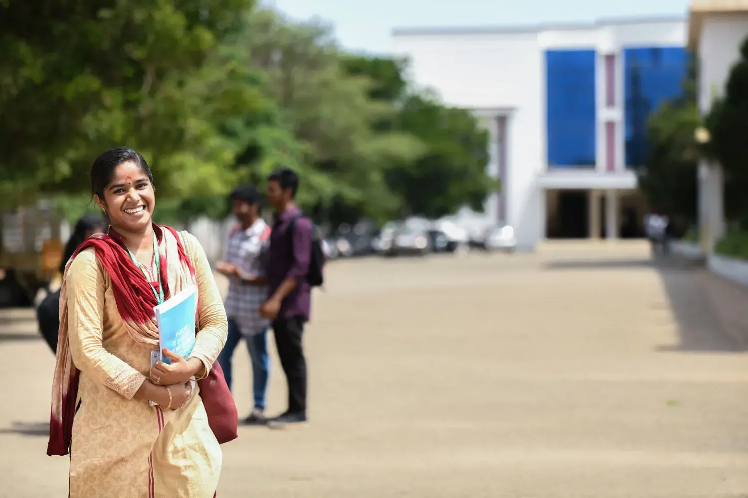 A Park's College student smiling on campus