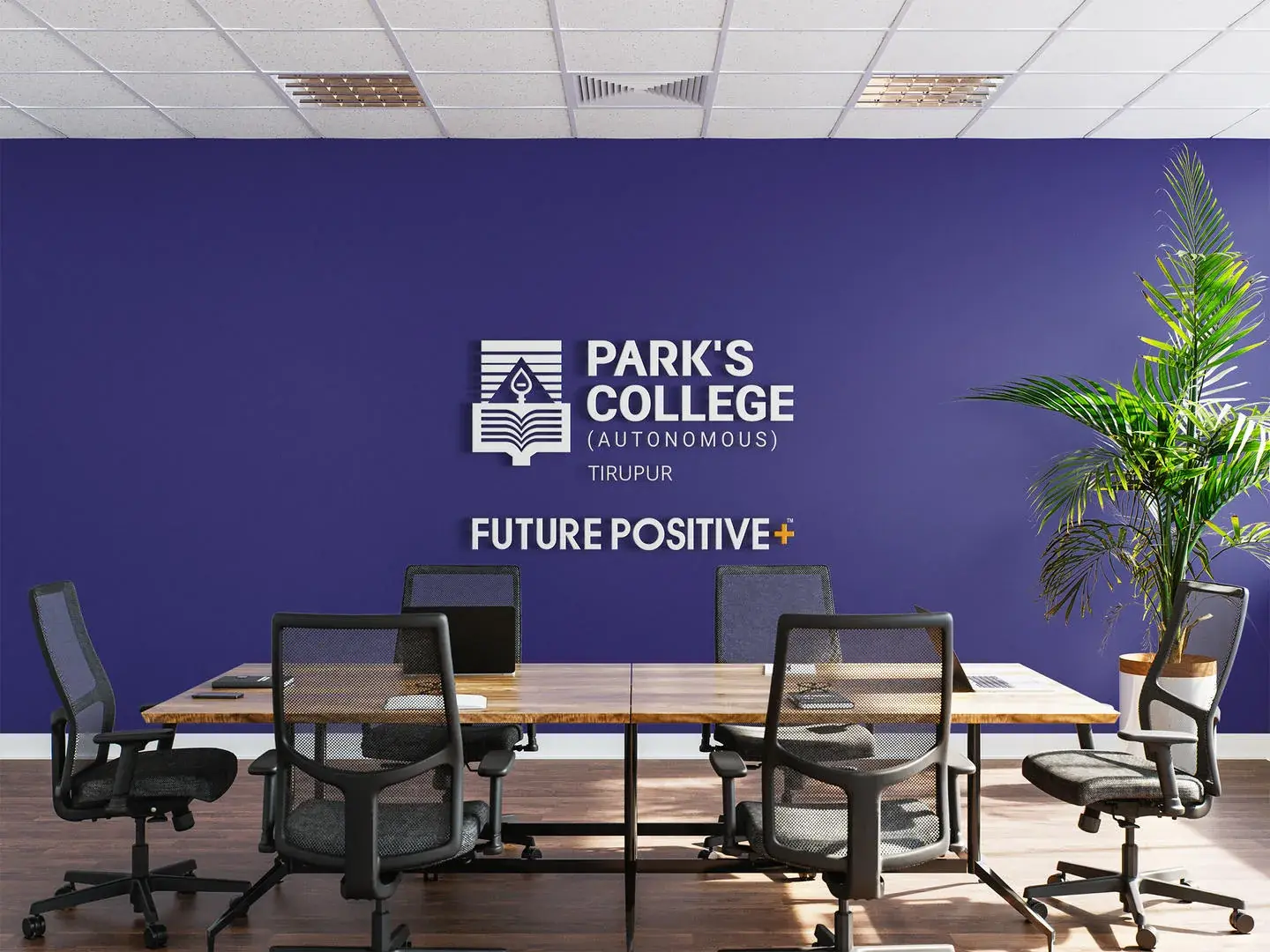 Park's College branded conference room with institutional purple identity applied